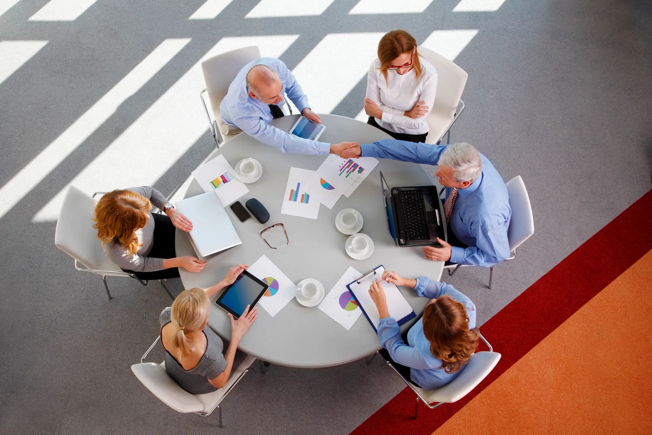 Business team meeting around round table