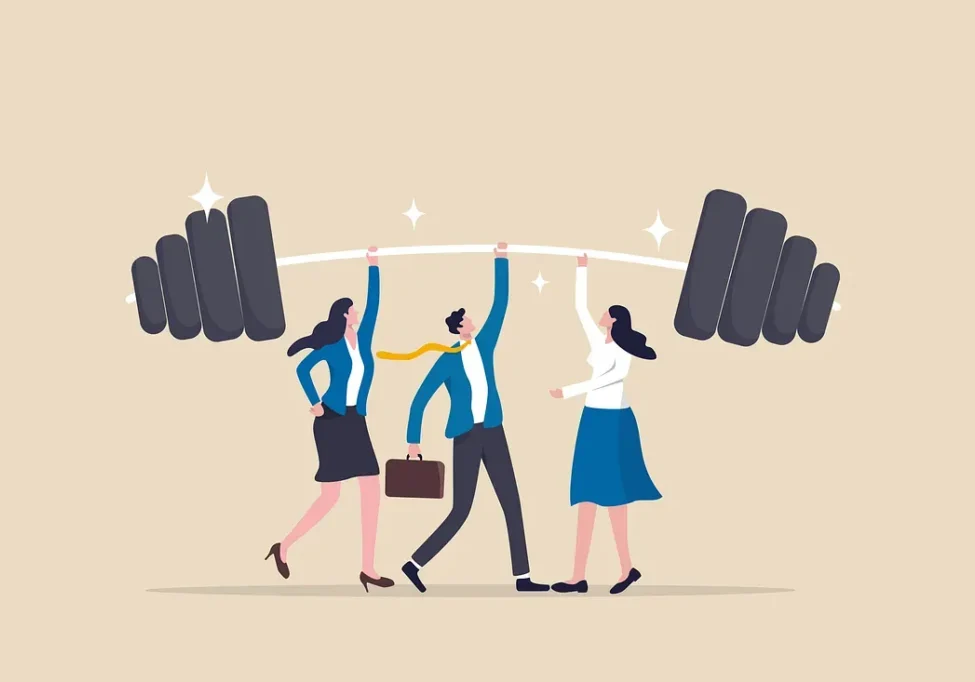 Business team lifting giant barbell together
